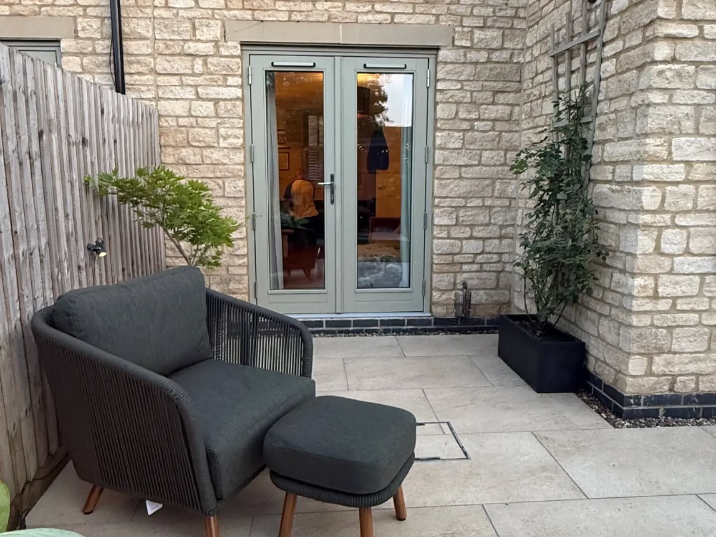 Cotswold stone courtyard patio with seating