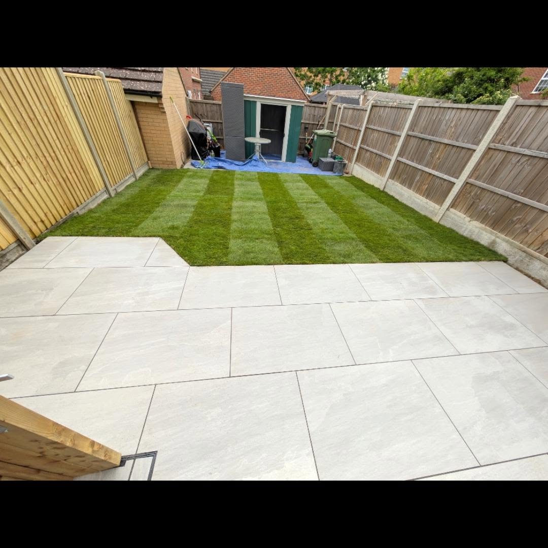 Large patio with new slatted fence surround